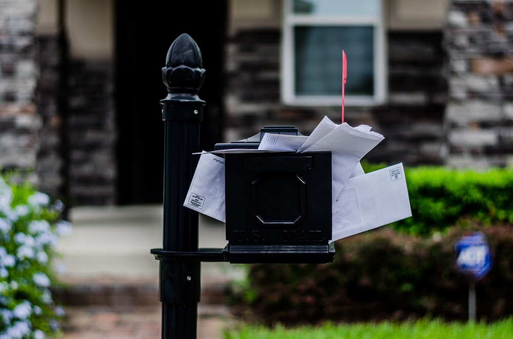 Full mailbox in front of the house