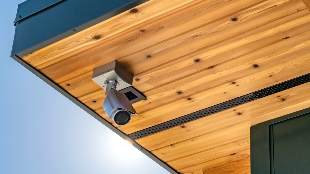 Panorama Home with security camera installed on the wooden underside of its roof
