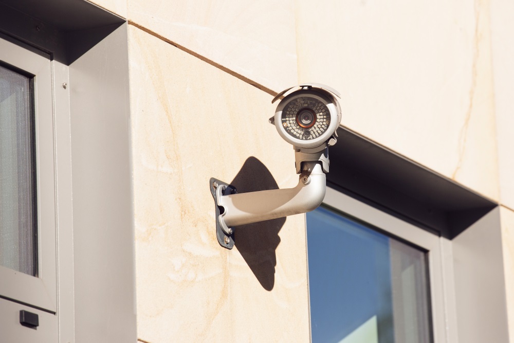 Security camera on outdoor wall