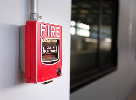 Fire alarm switch on the factory wall