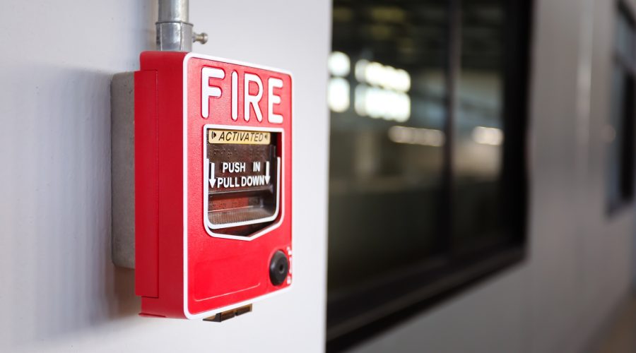 Fire alarm switch on the factory wall