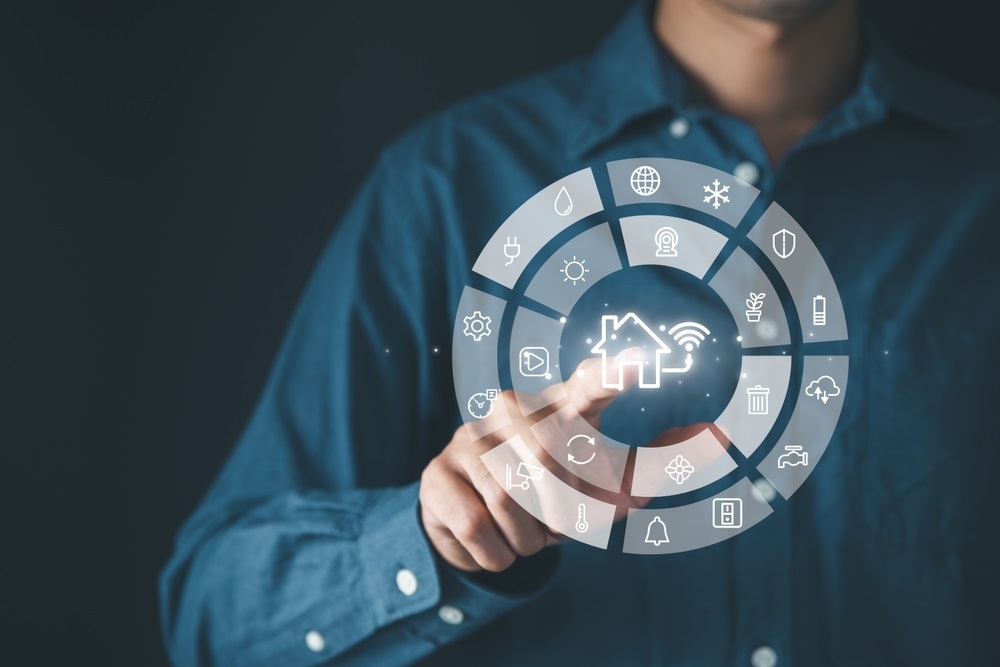 Man manage smart home features including security, lighting, and temperature