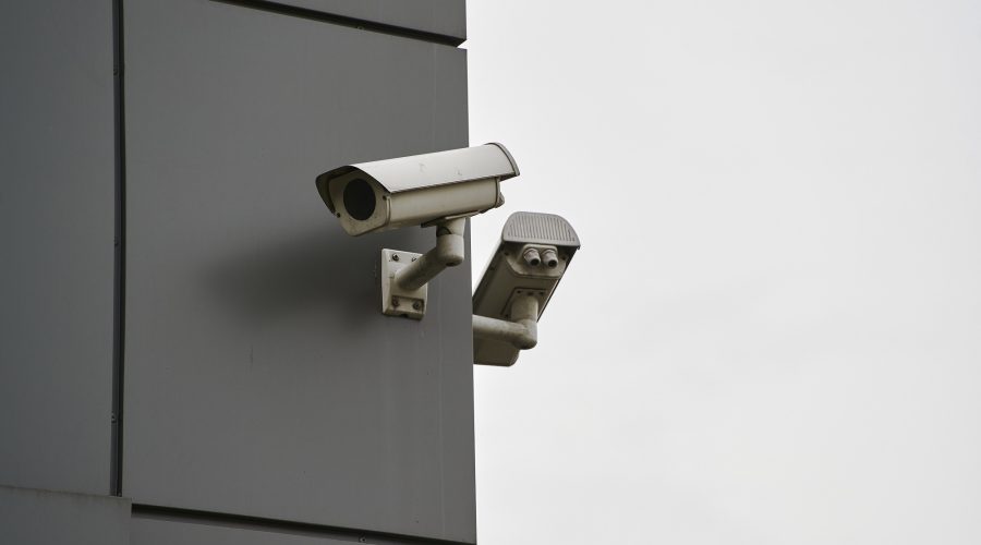 Outdoor security camera with a waterproof cover