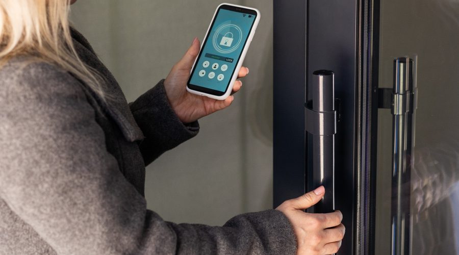 Smart phone with smart lock home application on the screen